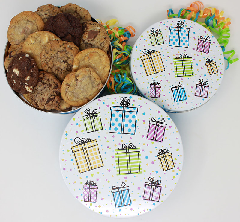 Felix & Norton Cookies - Nifty Gifty Tin. White background with images of presents in pink, blue, yellow and green.